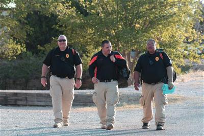 Three Police Officers Walking Together